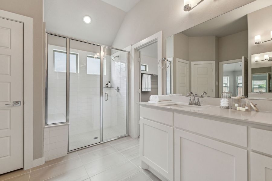 Primary Bathroom in the Daltrey home plan by Trophy Signature Homes – REPRESENTATIVE PHOTO