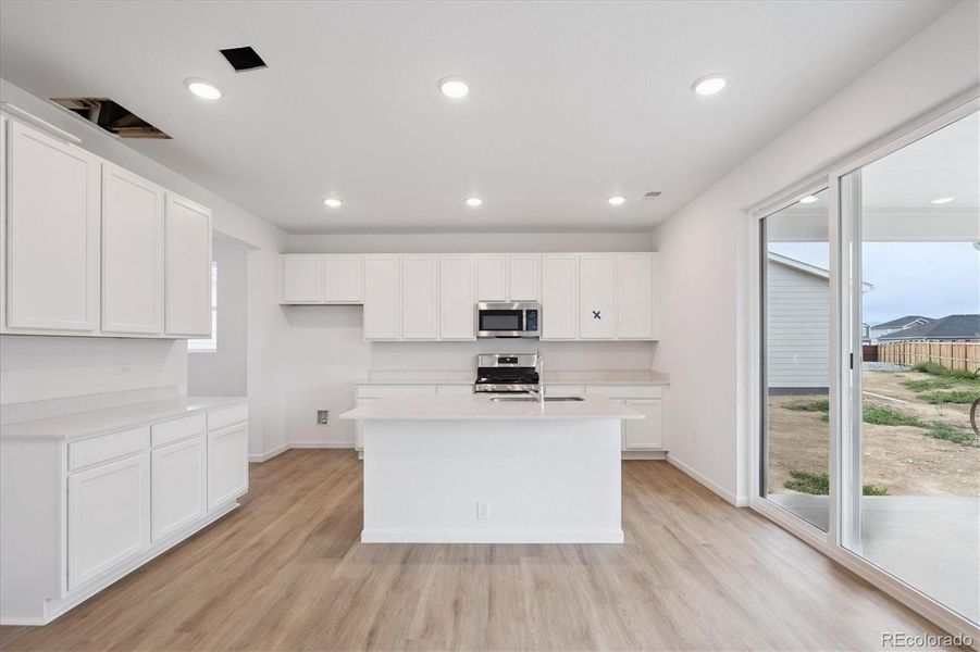 Furnished interior view inside a new home in Fossil Creek, Windsor (Image 7).