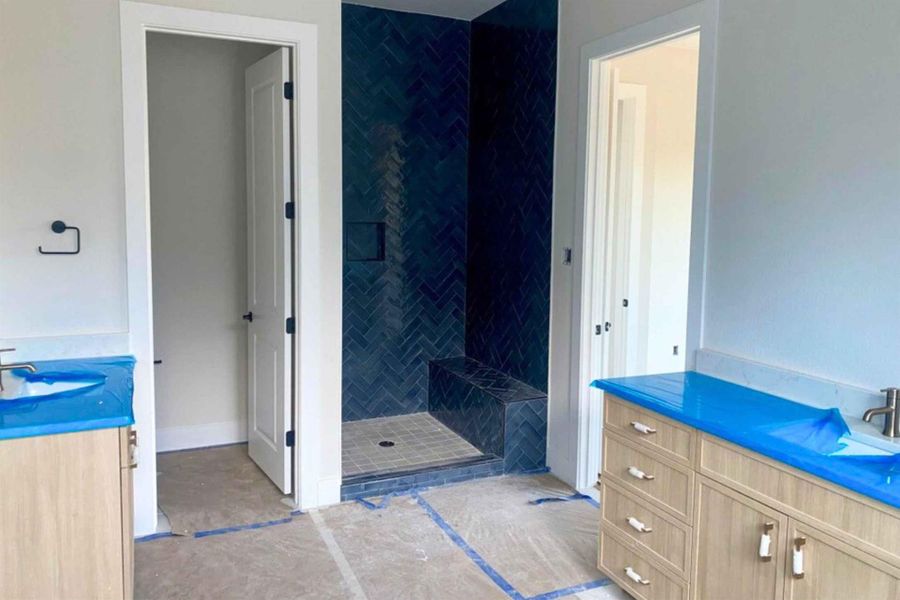 Bathroom with vanity and a stall shower