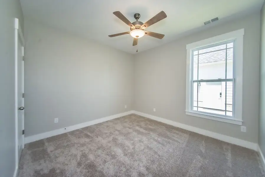 Representative unfurnished interior of a home built from the Beaumont Elite by Enchanted Homes in Smokey Hills, Campobello (Image 33).