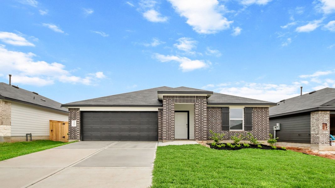 Front exterior of a new home in Mill Creek, Magnolia, TX, highlighting curb appeal (Image 2). Front exterior of a new home in Mill Creek, Magnolia, TX, highlighting curb appeal (Image 2).