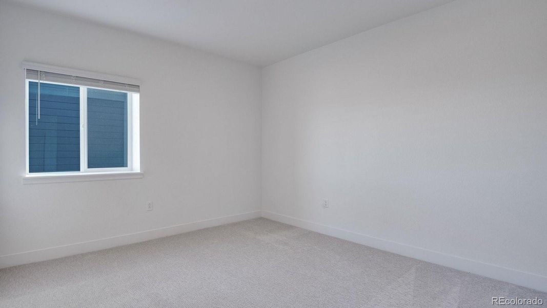 Spacious, unfurnished interior of a new home in Trails at Crowfoot, Parker (Image 23).