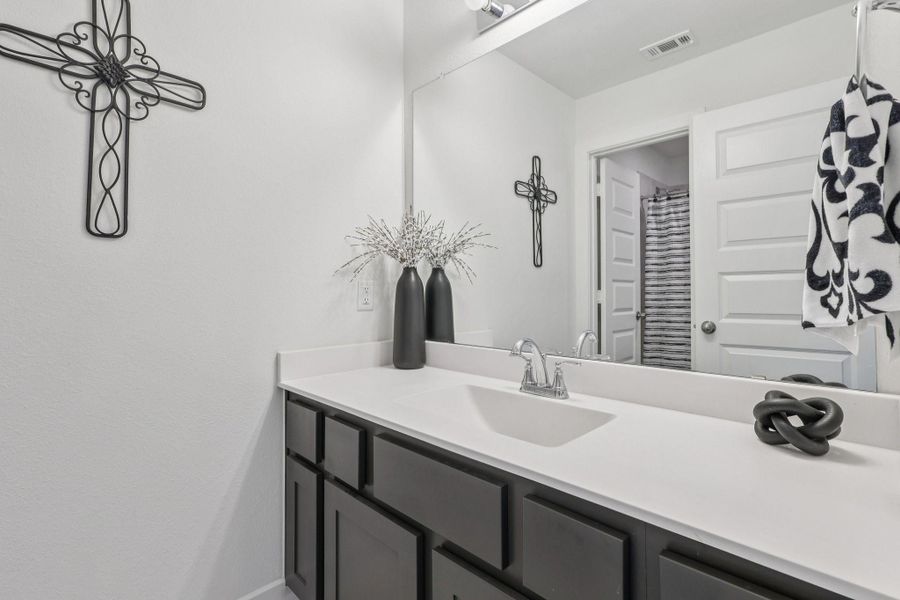 Additional full bath upstairs.