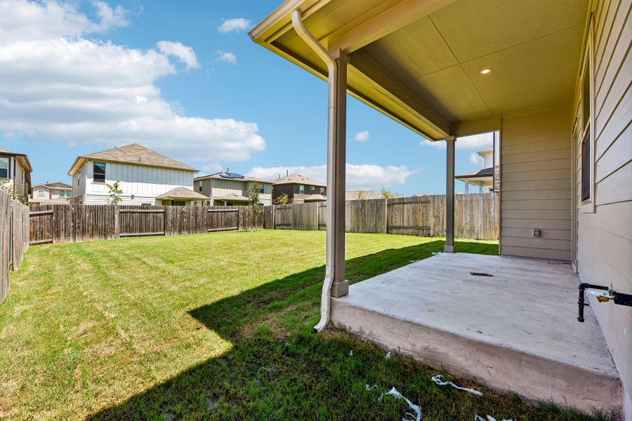 Exterior details and patio area of a home in Crosswinds, Kyle (Image 3).