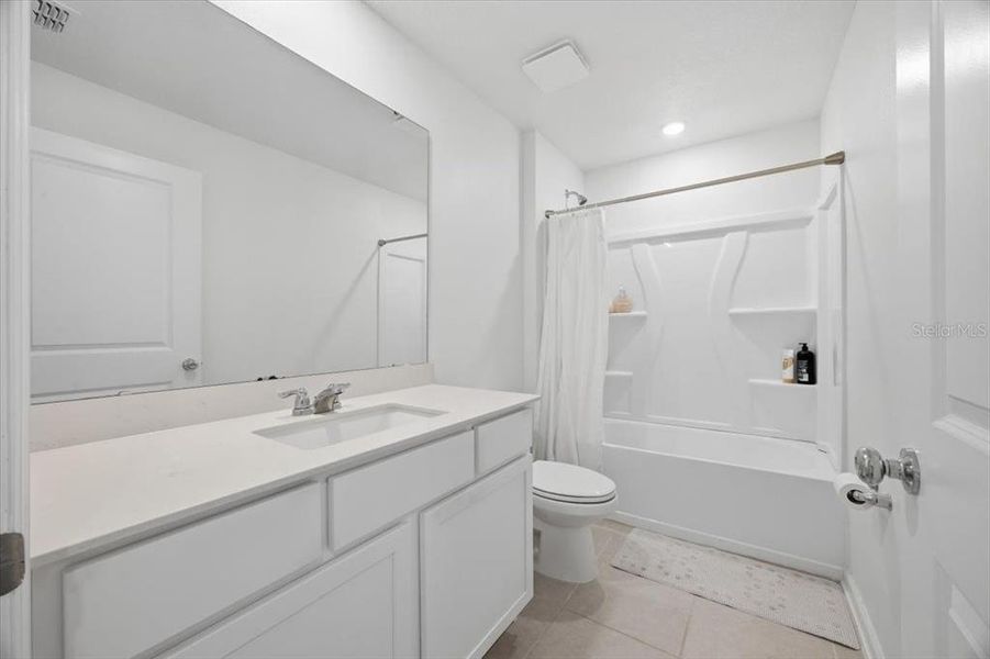 Furnished interior view inside a new home in Hunt Club Groves, Lake Wales (Image 18).