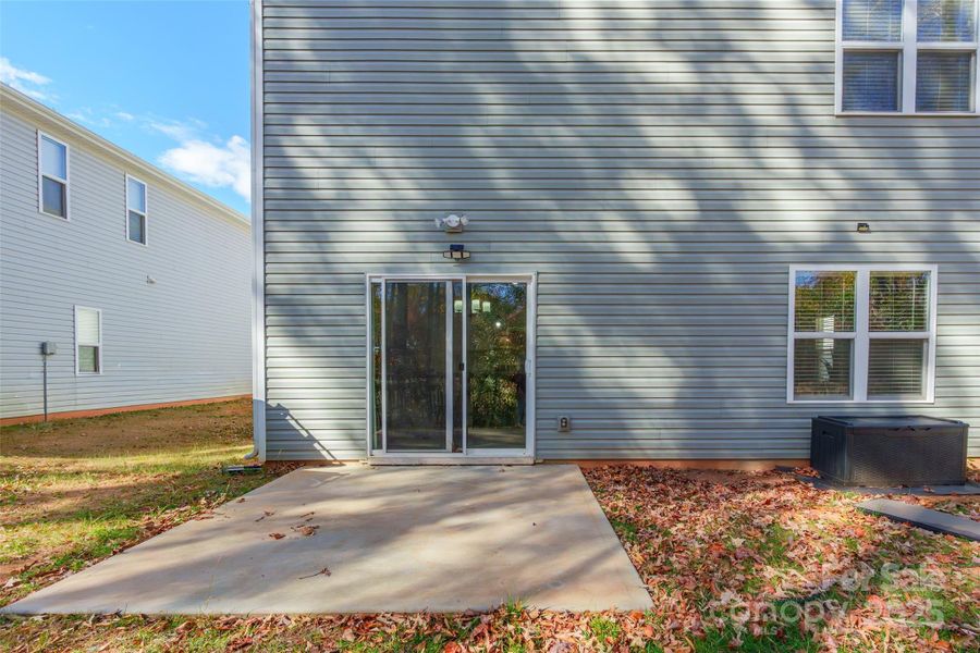 Exterior details and patio area of a home in McGee Place, Charlotte (Image 25).