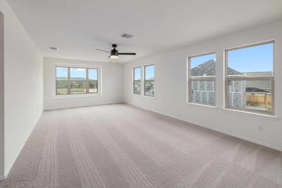 Spacious, unfurnished interior of a new home in River Bluff, Leander (Image 22).