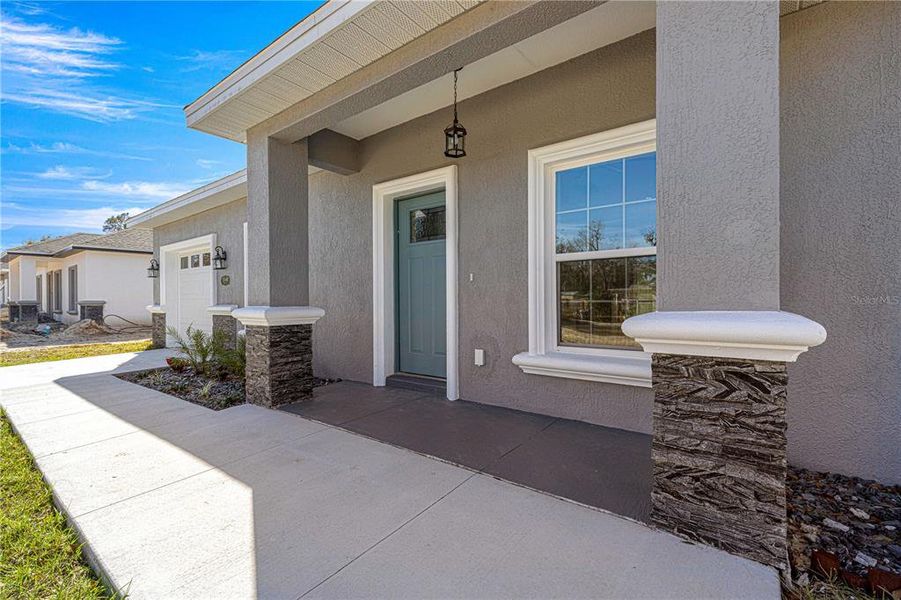 Exterior details and patio area of a home in , Summerfield (Image 3).