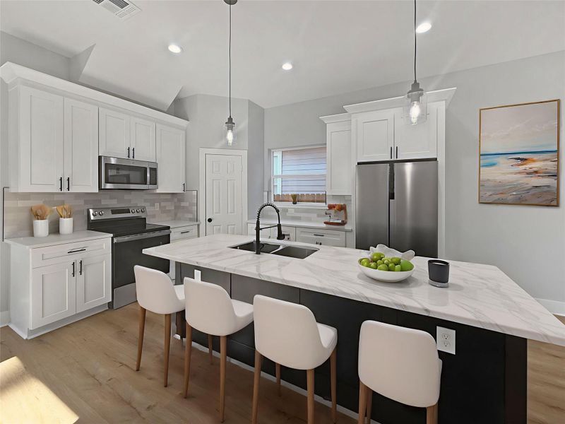 Modern Dream Kitchen featuring an expansive Quartz Island! Staged