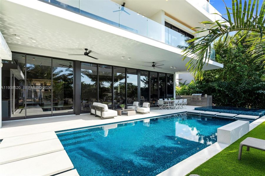 Exterior details and patio area of a home in , North Miami (Image 26).