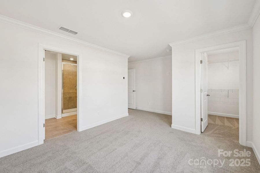 Spacious, unfurnished interior of a new home in Meadows at Wilson Farms - The Heights Series, Fort Mill (Image 24). Spacious, unfurnished interior of a new home in Meadows at Wilson Farms - The Heights Series, Fort Mill (Image 24).