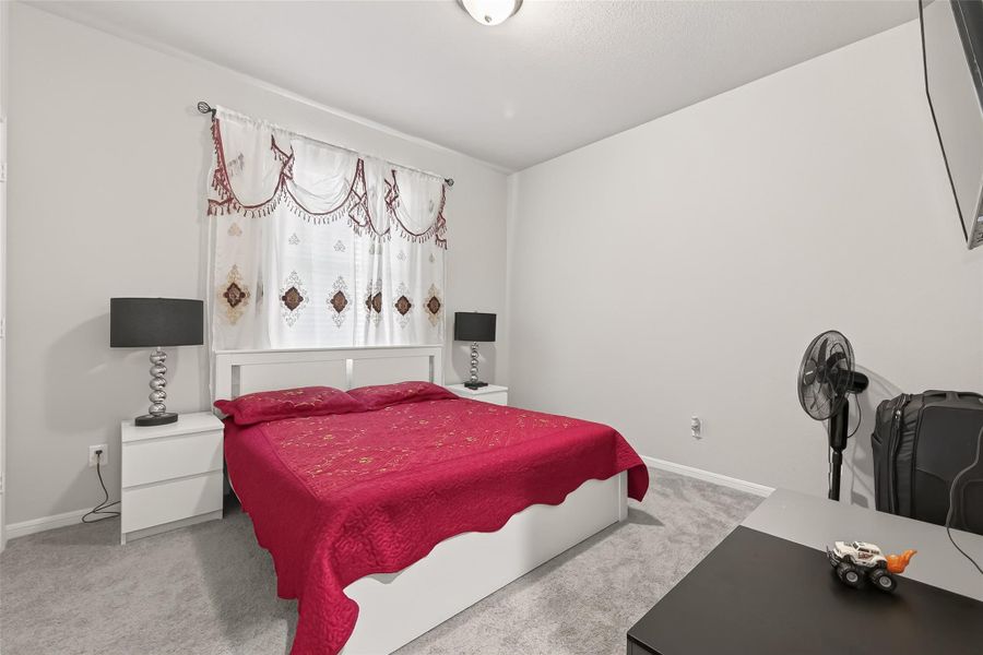 Furnished interior view inside a new home in Sunterra, Katy (Image 10).