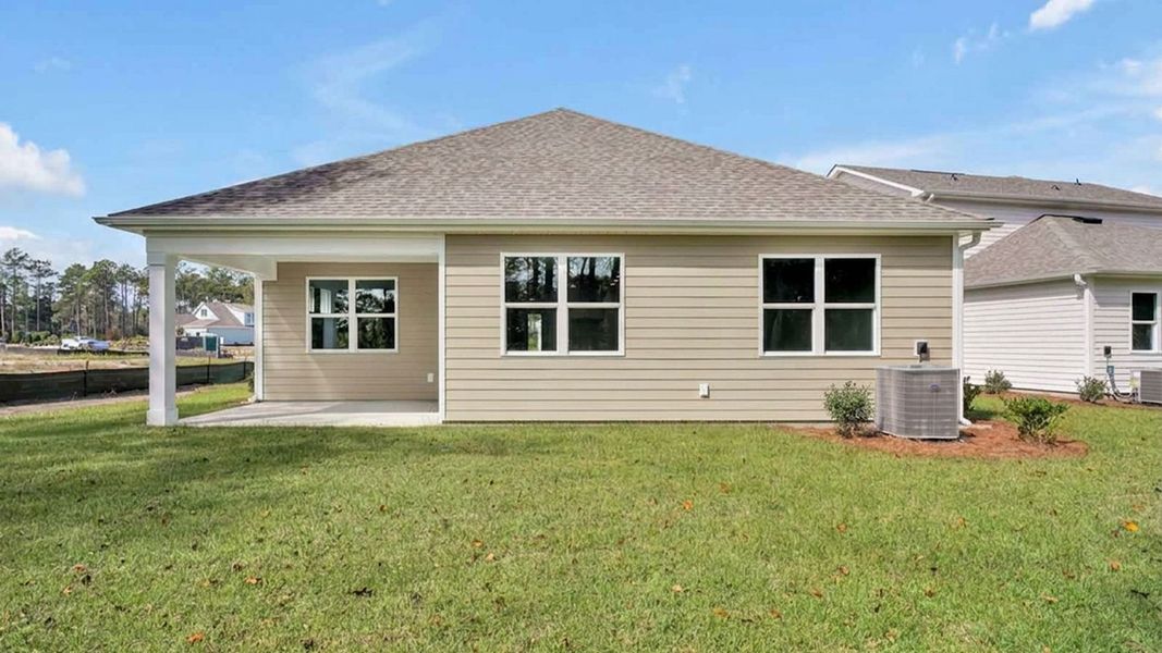 Exterior details and patio area of a home in The Haven at Indigo Preserve, Leland (Image 3).