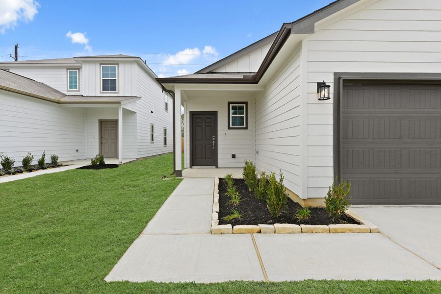 Exterior details and patio area of a home in Barrett Crossing, Crosby (Image 3).