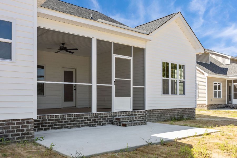 Exterior details and patio area of a home in The Preserve at Langston, Winterville (Image 28).