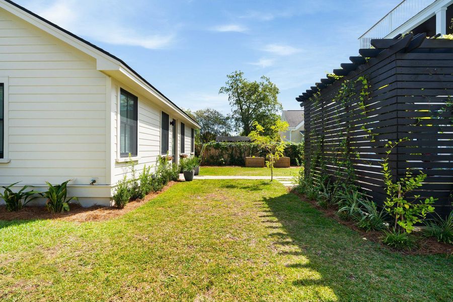 Exterior details and patio area of a home in , Charleston (Image 45).