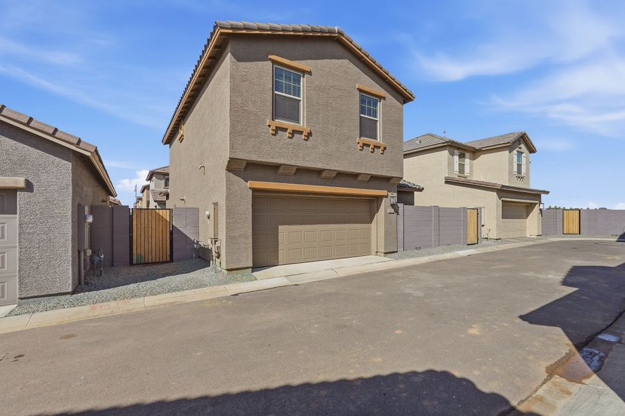 Front exterior of a new home in Parkside, Avondale, AZ, highlighting curb appeal (Image 21).