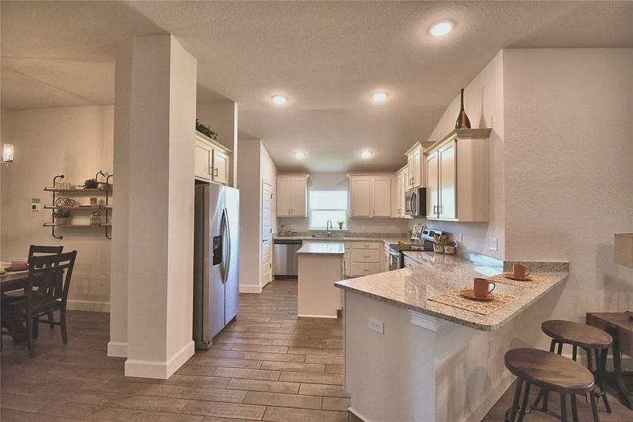 Furnished interior view inside a new home in Magnolia Park, Haines City (Image 11).