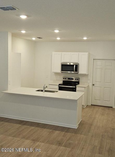 Furnished interior view inside a new home in Liberty Cove, Yulee (Image 17).