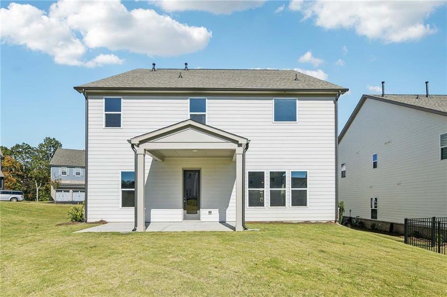 Exterior details and patio area of a home in East Harbor II at Chestatee, Dawsonville (Image 3).