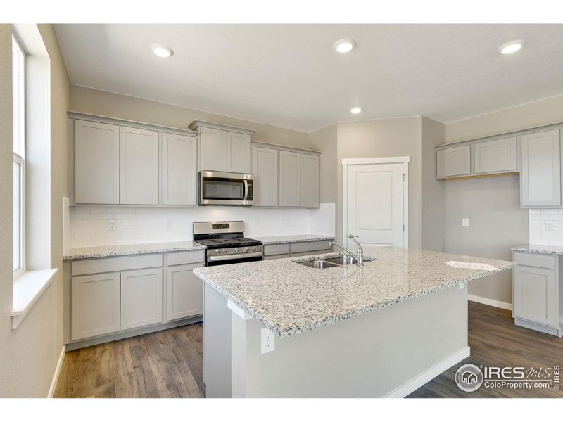 Furnished interior view inside a new home in Settlers Crossing, Commerce City (Image 4).