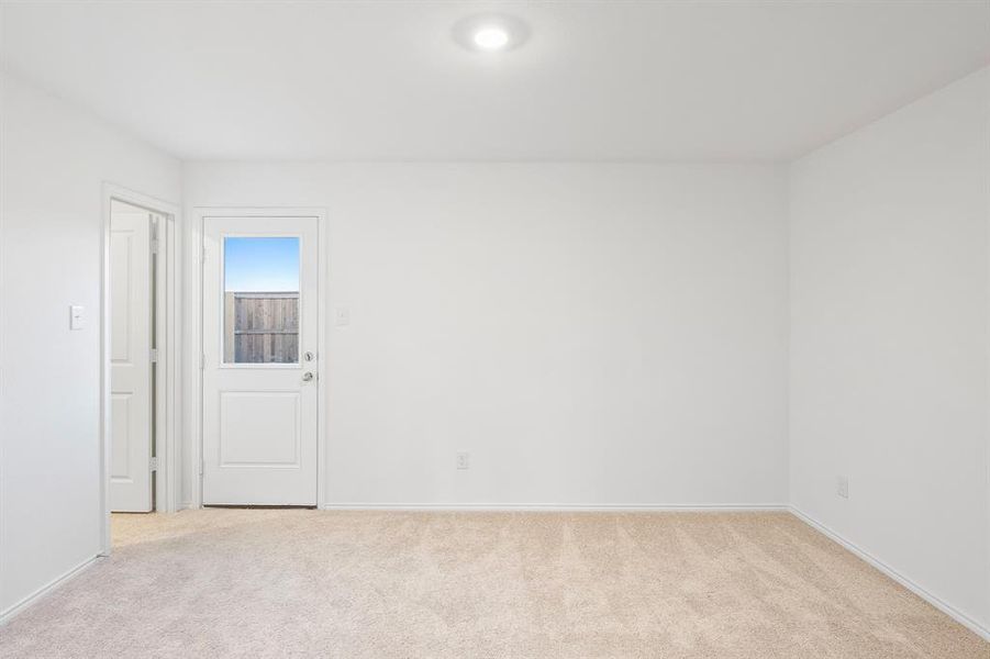 View of carpeted spare room