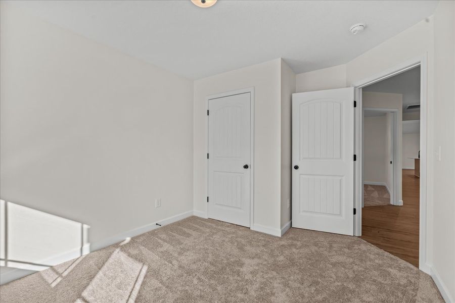 Representative unfurnished interior of a home built from the Cheshire by Enchanted Homes in Hampshire Heights, Moore (Image 25).