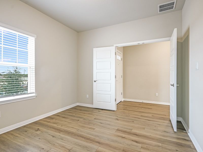 Spacious, unfurnished interior of a new home in Butler Farms - Boulevard Collection, Liberty Hill (Image 8).
