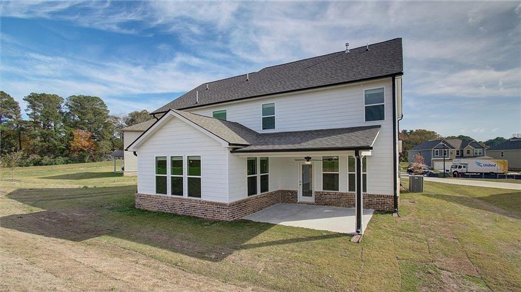 Exterior details and patio area of a home in Northcroft, Loganville (Image 20).