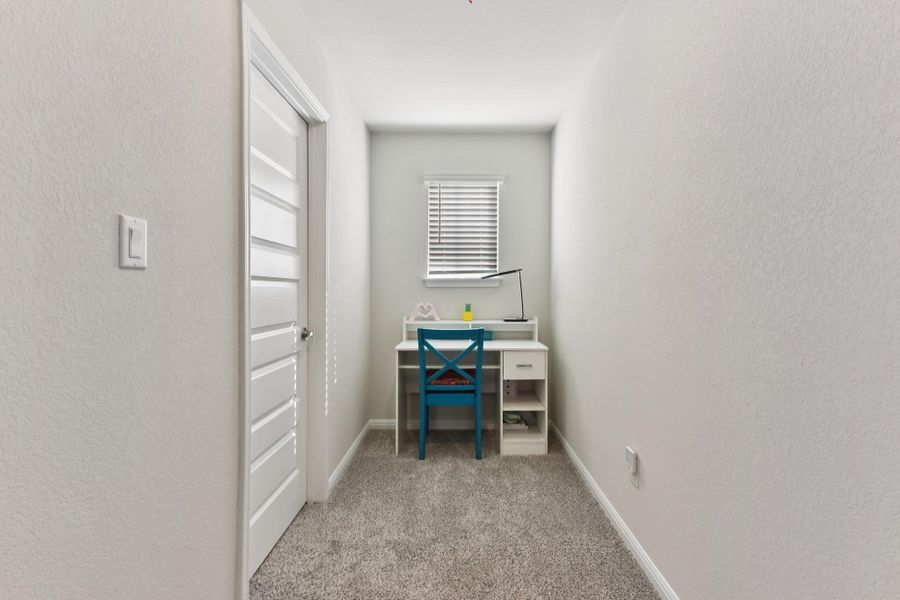 Furnished interior view inside a new home in Big Sky Ranch - Executive Collection, Dripping Springs (Image 14).