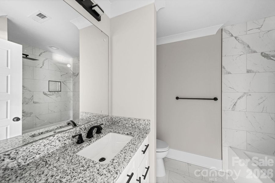 Furnished interior view inside a new home in , Charlotte (Image 12).