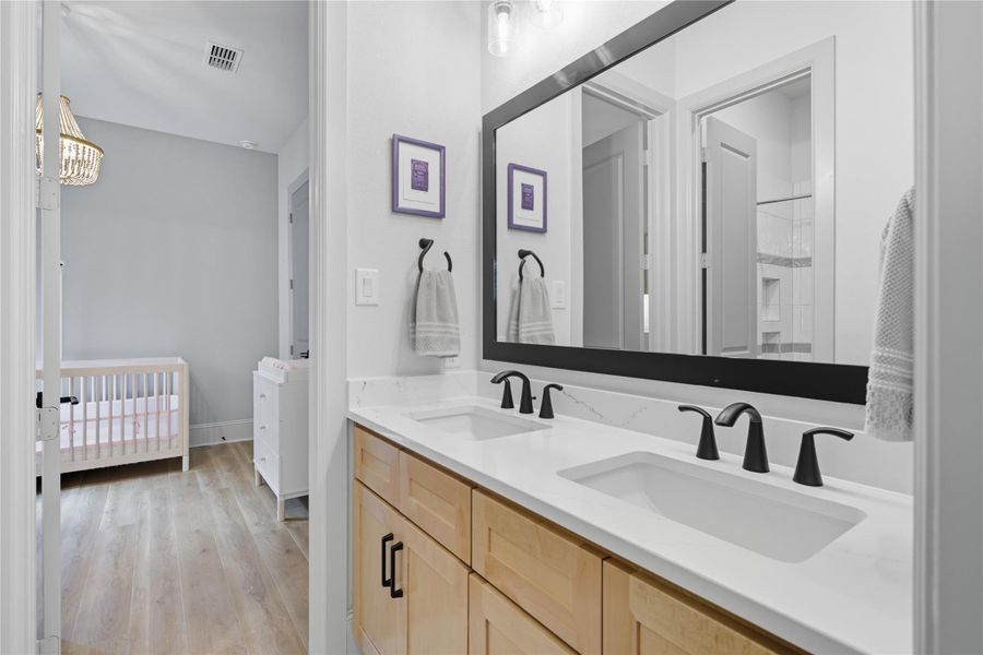 Double sinks in secondary bathroom 3. View from bedroom 4 Double sinks in secondary bathroom 3. View from bedroom 4