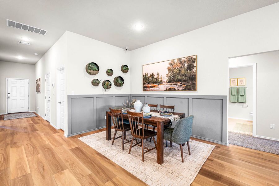 This is the dining area of the Hawkins plan within the model home in Carillon at 13305 Eppright Trace Blvd., Manor, TX. This is the dining area of the Hawkins plan within the model home in Carillon at 13305 Eppright Trace Blvd., Manor, TX.