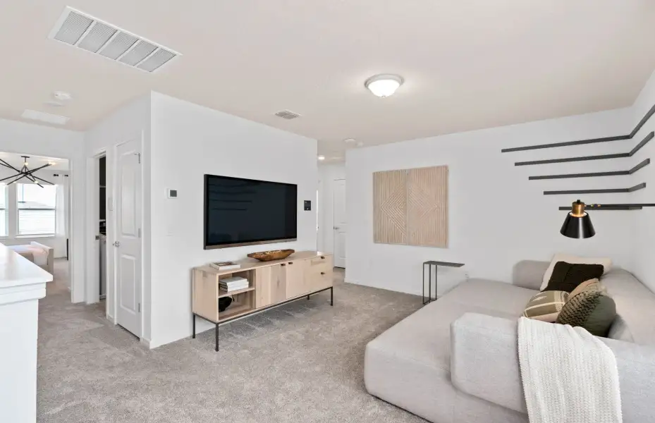 Representative furnished interior of a home built from the Mill Run by Pulte Homes in Waypointe, Port Orange (Image 8).