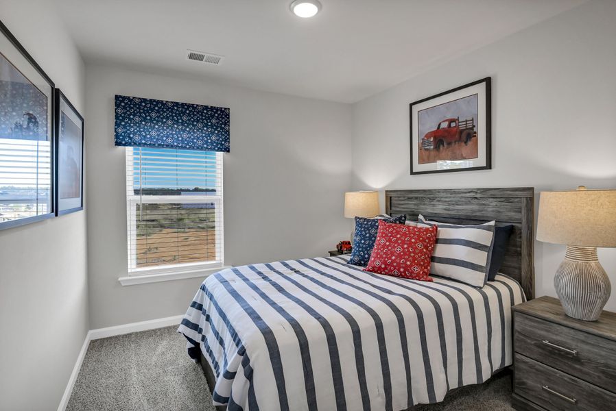 Representative furnished interior of a home built from the Jarrod by Veranda Homes in Trenton Place, Roebuck (Image 46).