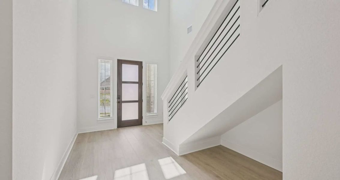Spacious, unfurnished interior of a new home in Sunfield, Buda (Image 9). Spacious, unfurnished interior of a new home in Sunfield, Buda (Image 9).