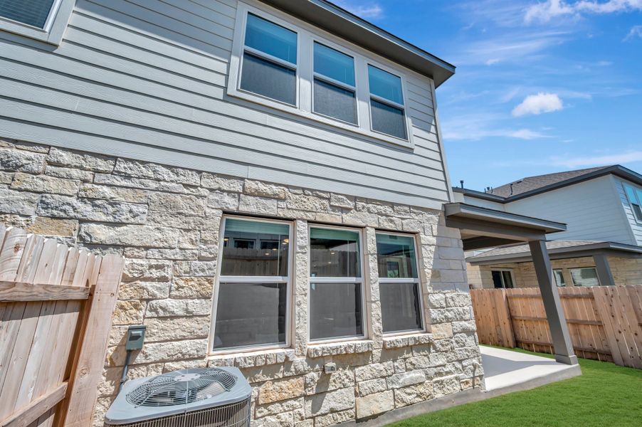 Exterior details and patio area of a home in Park Central, Georgetown (Image 31).