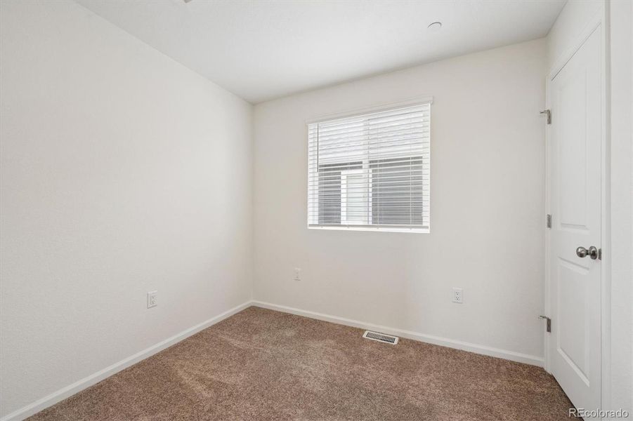 Spacious, unfurnished interior of a new home in Reunion, Commerce City (Image 18).