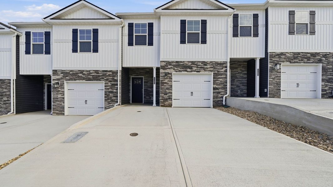 Front exterior of a new home in The Arbor Townhomes, Kingsport, TN, highlighting curb appeal (Image 2).