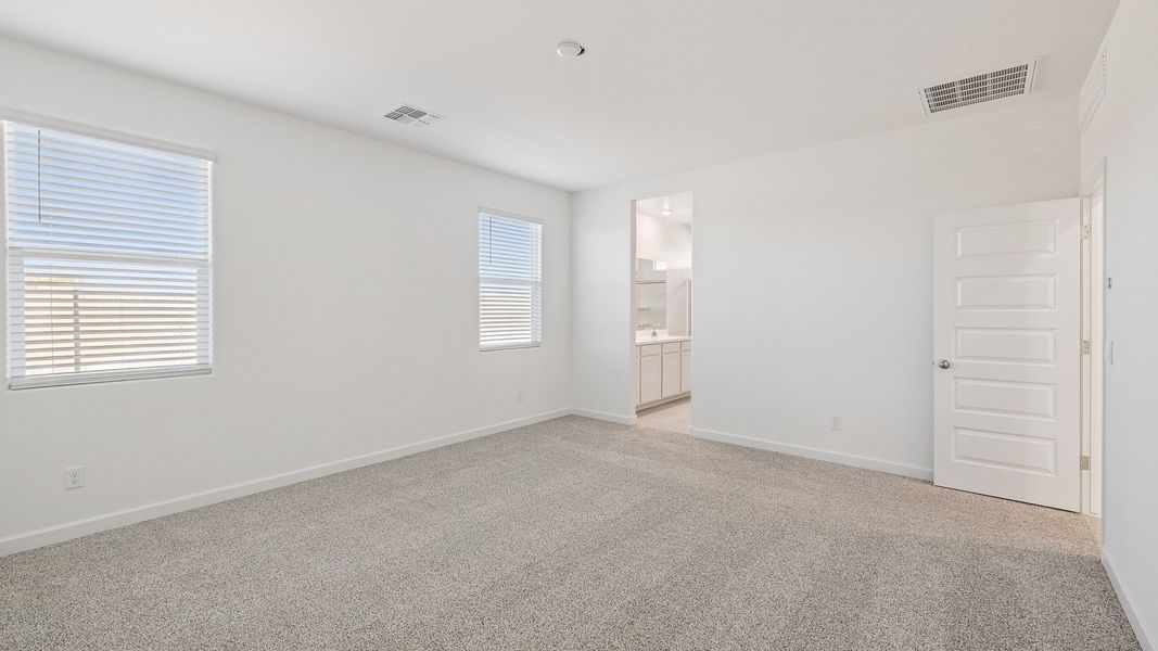 Spacious, unfurnished interior of a new home in Desert Moon Estates, Buckeye (Image 21).