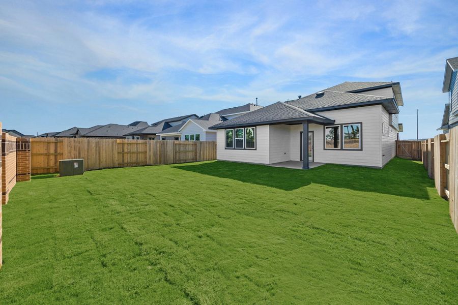 Exterior details and patio area of a home in Elyson, Katy (Image 2).