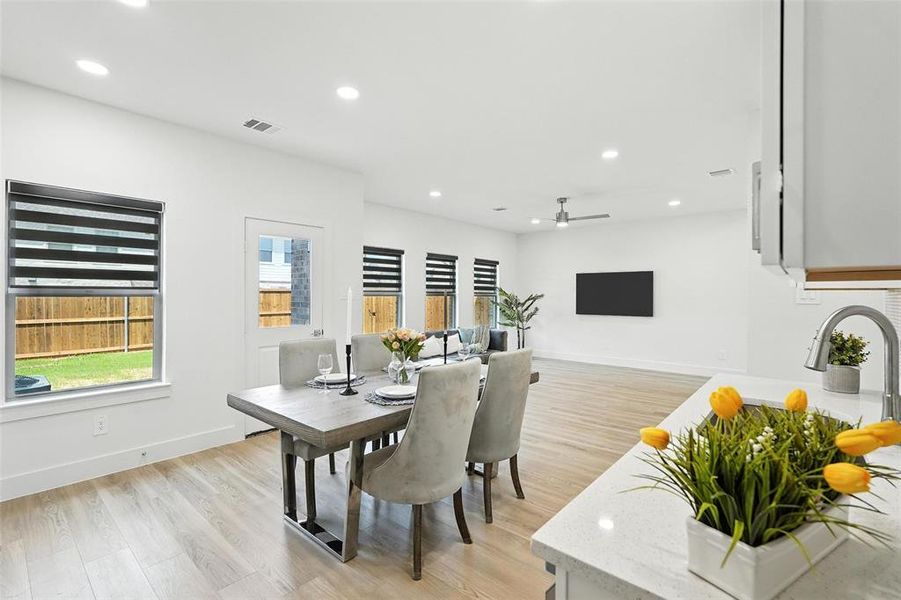 Dining space featuring recessed lighting, light wood-style floors, and ceiling fan