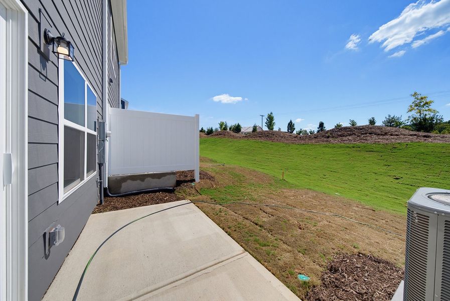 Exterior details and patio area of a home in Sweetbrier, Durham (Image 3).