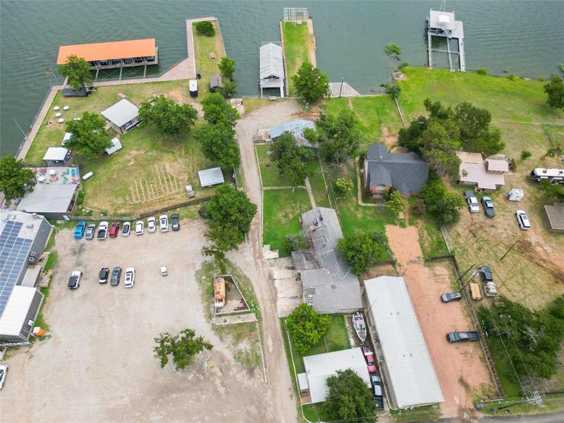 Aerial view of property and surrounding area with a large body of water address is the 350 high top only part shop and smaller older house Aerial view of property and surrounding area with a large body of water address is the 350 high top only part shop and smaller older house