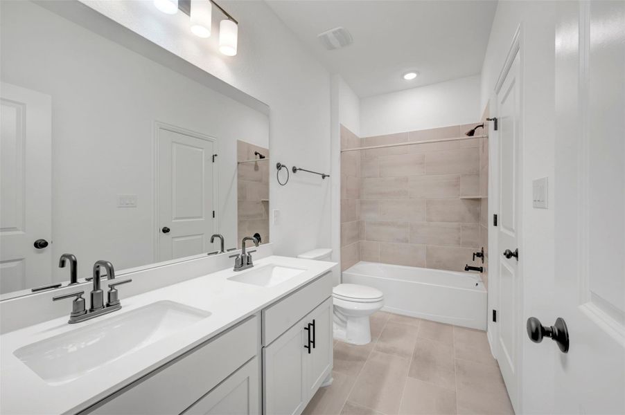 Furnished interior view inside a new home in Heritage, Dripping Springs (Image 10).