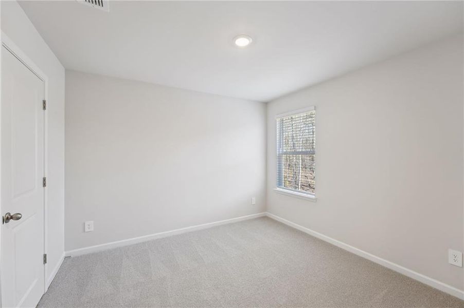 Spacious, unfurnished interior of a new home in Creekside at Oxford Park, Fairburn (Image 35).