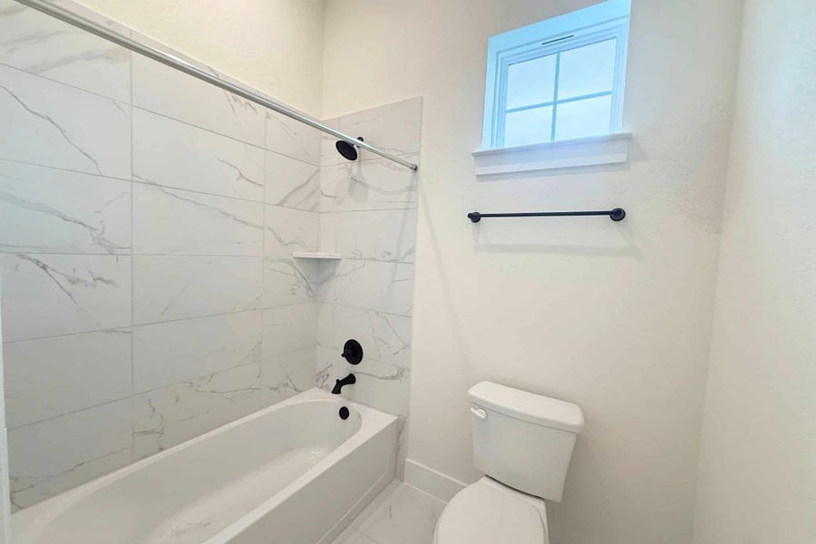 Furnished interior view inside a new home in Heights at San Gabriel, Georgetown (Image 12).