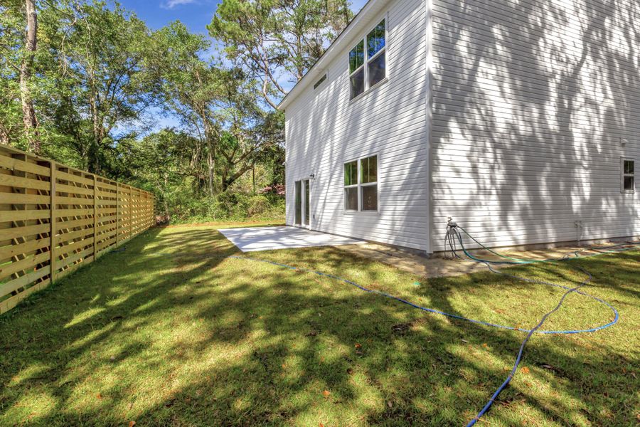 Exterior details and patio area of a home in , Awendaw (Image 2).