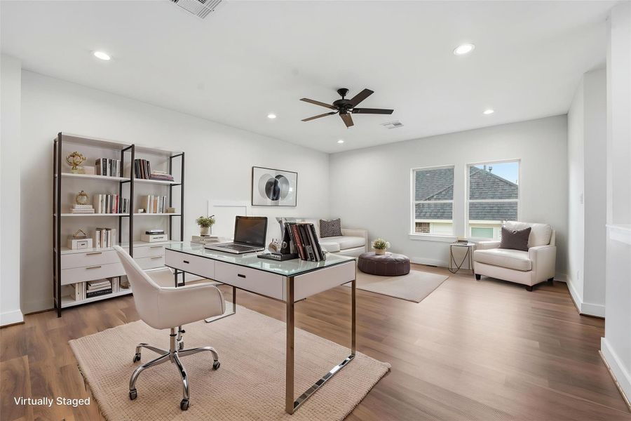 A versatile upstairs space that can be your home office or your favorite game room. A versatile upstairs space that can be your home office or your favorite game room.