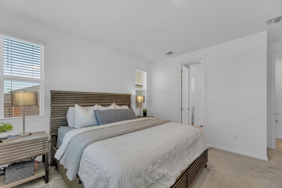 Furnished interior view inside a new home in Seasons at Carillon, Manor (Image 17).